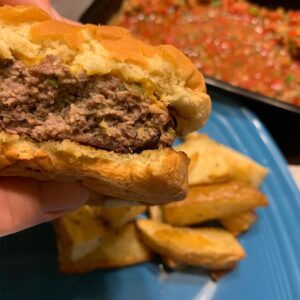 A mouth watering Hatch Green Chile Cheeseburger with fries and salsa. A burger like this only comes along once in a lifetime (or as many times as I cook it)!